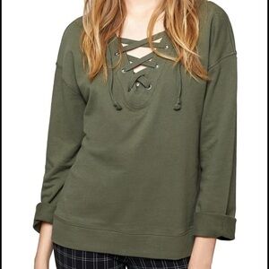 Sanctuary sweatshirt with lace up front.